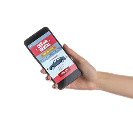 Woman holding mobile phone with open car rent app on white background