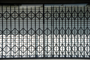 Security gate on old urban window