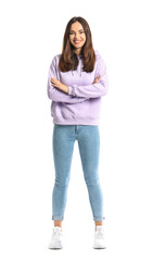 Beautiful young woman in stylish hoodie on white background