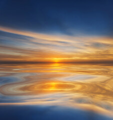 Sunlight reflected on calm, smooth water