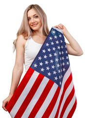 Portrait of a smiling woman holding USA flag isolated on white background