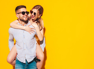 Sexy smiling beautiful woman and her handsome boyfriend. Happy cheerful family having tender...