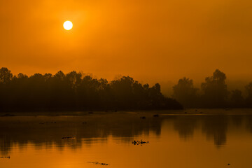 The background of the sea by the evening sea, with natural beauty (sea water, rocks, sky) and fishermen are fishing by the river bank, is a pleasure during travel.