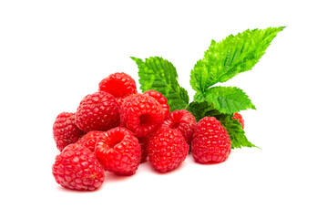 Close up of red raspberries with green leaves on white background