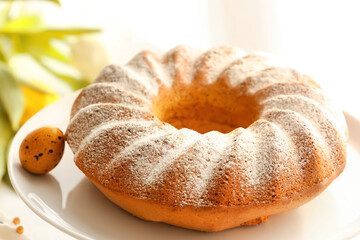 Tasty Easter cake on dessert stand