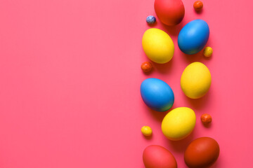 Fototapeta na wymiar Multicolored Easter eggs on color background