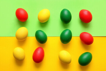 Multicolored Easter eggs on color background