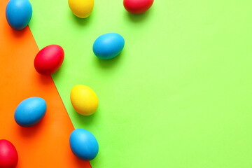 Multicolored Easter eggs on color background