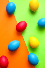 Fototapeta na wymiar Multicolored Easter eggs on color background