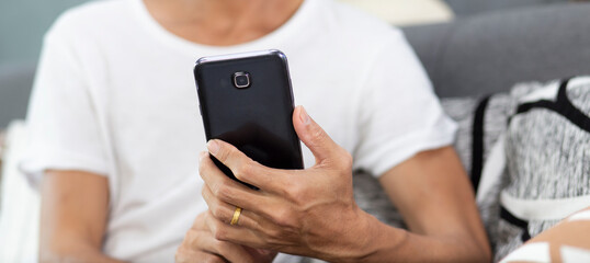person using  smartphone with online learning , social network and application during stay at home
