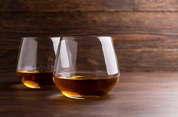 Brandy glasses. Strong spirits in glasses, drinks at the bar