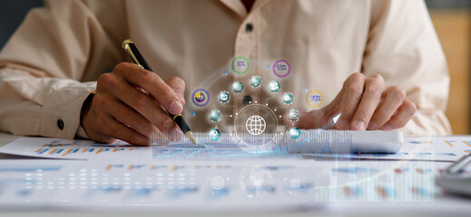 Close up of Businessman accountant or financial expert coins double exposure analyze business report graph finance chart corporate finance economy banking business stock market research concept.