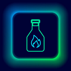 Glowing neon line Ketchup bottle icon isolated on black background. Colorful outline concept. Vector