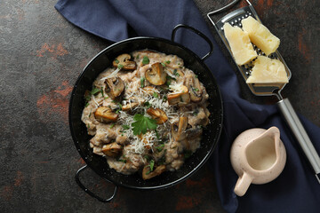 Concept of tasty food with risotto with mushrooms, top view
