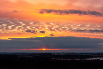 Colorful panoramic sky during sunrise and sunset. beautiful clouds over the city