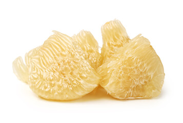 Slices of pomelo fruit on white background