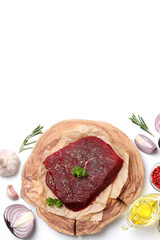 Concept of tasty food with raw beef steak on white background