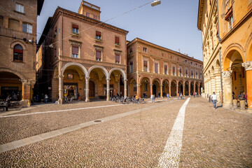 Morning view on Seven churches square in old town of Bologna city. Ancient buildings with galleries in Emilia Romagna region in Italy © rh2010