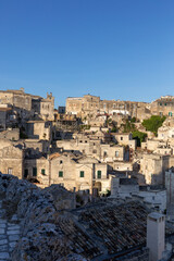 Fototapeta na wymiar View of the Sassi di Matera a historic district in the city of Matera, well-known for their ancient cave dwellings. Basilicata. Italy