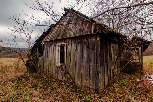 Old abandoned and demolished wooden house