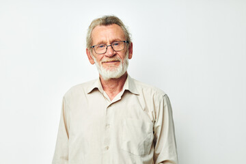 Obraz premium Portrait of happy senior man smile emotion hand gesture light background