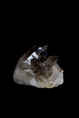 Smoky quartz, a brownish grey gemstone on black background.