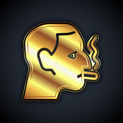 Gold Man smoking a cigarette icon isolated on black background. Tobacco sign. Vector