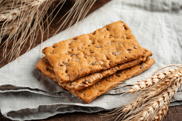 Fresh baked flat multigrain bread on napkin