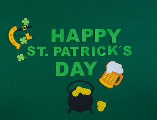 St. Patrick's Day. Banner design on green background with HAPPY ST. PATRICKS DAY and ornaments....