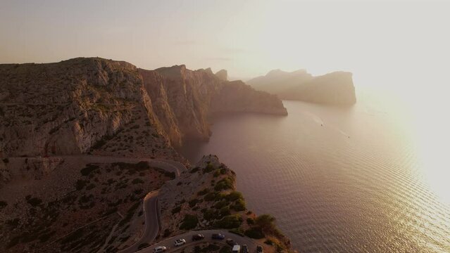 Cape Formentor Lighthouse and cliffs at sunset
