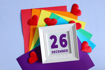 day of the month 26 December calendar . Calendar date in a white frame on a rainbow background