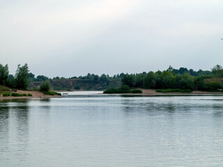 Fototapeta na wymiar sandy river bank on a clear day
