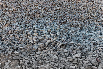 Granite crushed stone or graphy. Building material texture background.