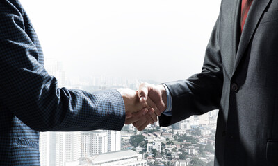 Close-up of the handshake of businessmen.