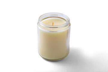 candle in a glass candlestick on a white background. insulation.