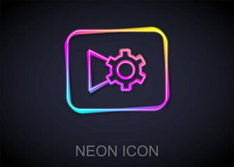 Glowing neon line Music or video settings button icon isolated on black background. Vector