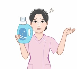 洗濯洗剤を持った女性
