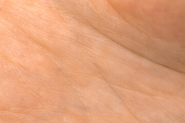 Human palm skin texture. Detail healthy pink skin background. Young girl, healthcare concept photo