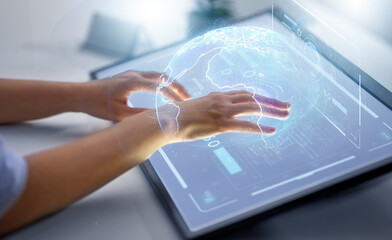 technology, virtual reality and people concept - hands on led light tablet or touch screen with...