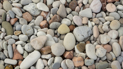 Portrait of beautiful pebbles found on Kolbano beach, South Central Timor district, East Nusa Tenggara province, Indonesia. Taken with a top angle