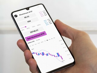 Stock etf exchange market chart down, Bear market data on smartphone. Exchange-traded fund....