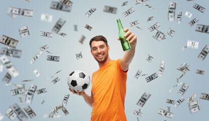 sport, leisure games and online betting concept - happy smiling man or football fan with soccer ball and bottle of beer over money on grey background background