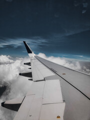 Naklejka na ściany i meble Cloud view from airplane window