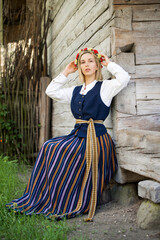 Fototapeta premium Latvian woman in traditional clothing. Ligo folk.