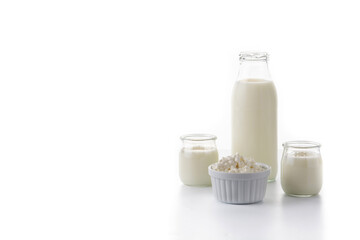 Milk kefir drink isolated on white background. Liquid and fermented milk product isolated on white...