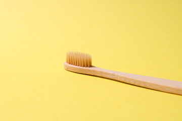 Bamboo toothbrush, top view, isolated