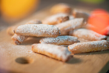Homemade cookies with fruit jam and cottage cheese on a light wooden background. A close photo. Dessert for breakfast.