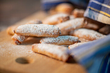 Homemade cookies with fruit jam and cottage cheese on a light wooden background. A close photo. Dessert for breakfast.