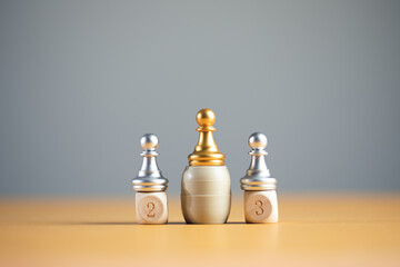 Chess on winners podium.