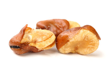fava bean, roasted and salty on white background